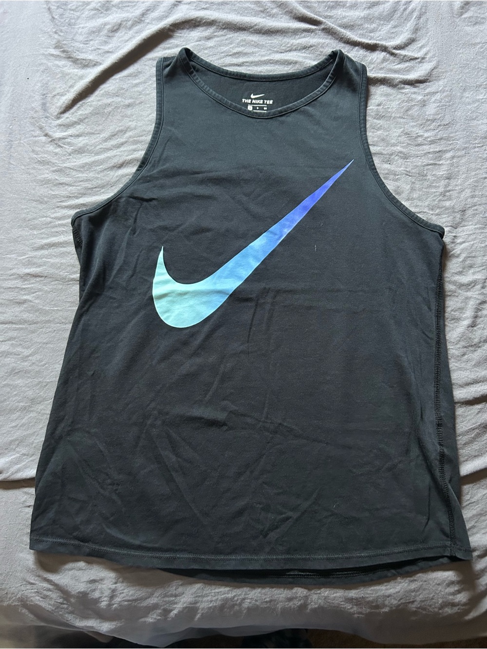 Nike Black Tank Top with Blue Swoosh Accent